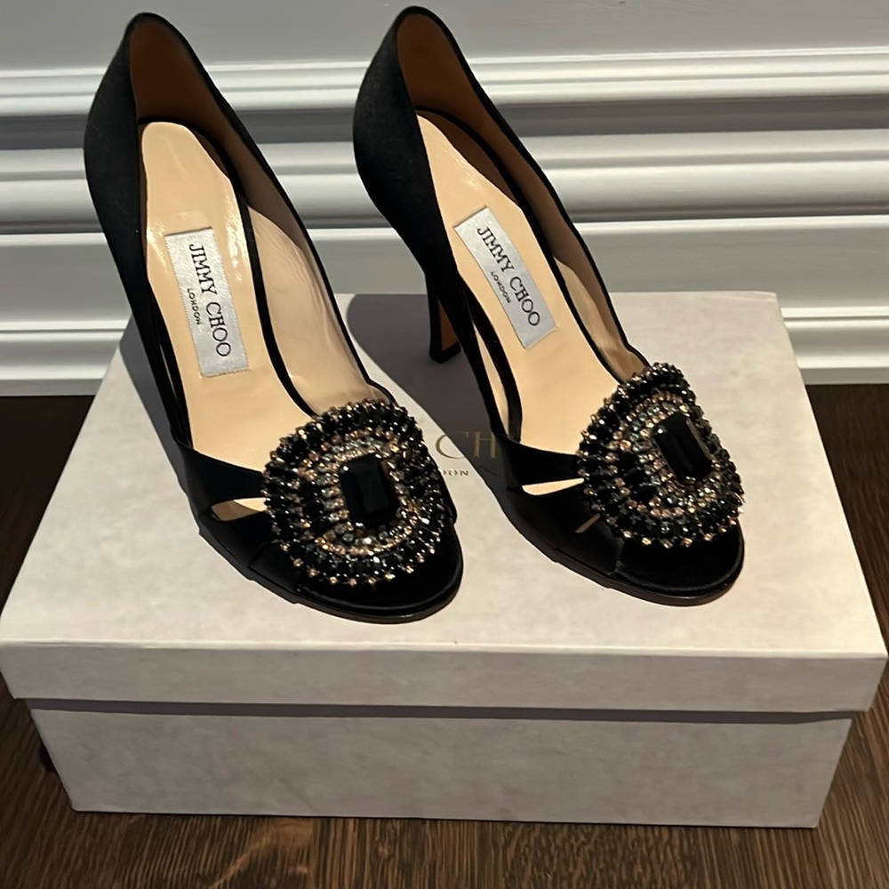 Black satin jimmy choo heels.